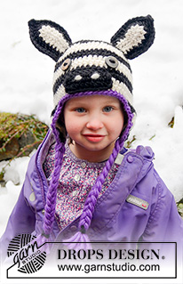 Pembe / DROPS Extra 0-1019 - Gehäkelte Zebra - Mütze für Babys und Kinder in DROPS Snow mit Ohrenklappen. Größe 1-8 Jahre.
