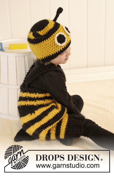 Bee Happy / DROPS Extra 0-1013 - Dziecięce spodenki na drutach pszczółka i czapka pszczółka na szydełku, z włóczki DROPS Snow. Robótka jest w paski. Rozmiary 1 - 6 lat.