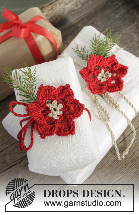It's A Wrap! / DROPS Extra 0-1068 - DROPS Kerst: gehaakte DROPS bloem van Cotton Viscose en Glitter