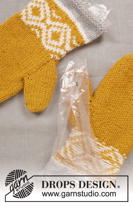 Touch of Gold / DROPS Extra 0-1245 - DROPS Velikonoce: plstěné rukavice – palčáky s norským vzorem pletené z příze Alaska.