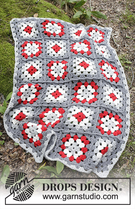 Cozy Holiday / DROPS Extra 0-1399 - Blanket with crochet squares for Christmas. The piece is worked in DROPS Snow or DROPS Wish