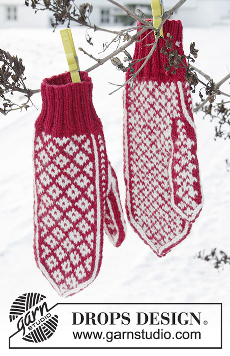 Christmas Magic Hands / DROPS Extra 0-1404 - Knitted mittens with multi-coloured Nordic pattern for Christmas. The piece is worked in DROPS Karisma.