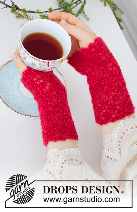 Holiday Pause / DROPS Extra 0-1439 - Knitted wrist warmers in DROPS Brushed Alpaca Silk. The piece is worked sideways with garter stitch, lace pattern and picot edge. Theme: Christmas.