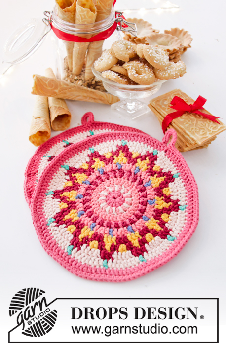 Baking Party / DROPS Extra 0-1444 - Crocheted pot holders in DROPS Paris. The piece is worked in the round in a circle and with colored pattern. Theme: Christmas.