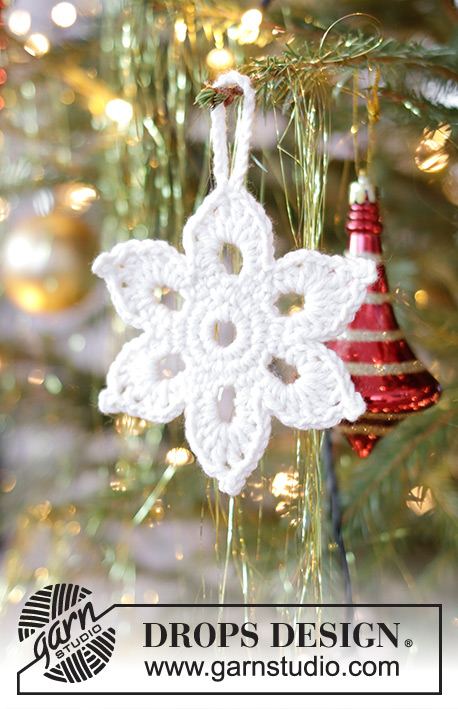 Shine Bright / DROPS Extra 0-1451 - Estrella de Navidad a ganchillo en DROPS Cotton Merino. Realizada en un círculo trabajando en redondo. Tema: Navidad.