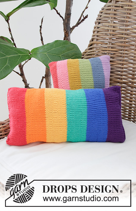 Cosy Rainbows / DROPS Extra 0-1488 - Knitted cushion with rainbow stripes in DROPS Paris.