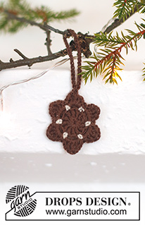 Gingerbread Stars / DROPS Extra 0-1554 - Biscoitos de gengibre em forma de estrela crochetados em DROPS BabyMerino. Tema: Natal.