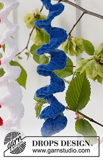 Happy Swirls / DROPS Extra 0-1569 - Virkad spiraldekoration till 17:e maj i DROPS Paris. Tema: nationaldag/nationalfärger.