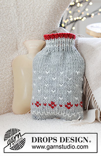 Christmas Sparkle Hot Bottle Cover / DROPS Extra 0-1582 - Housse tricotée pour bouillotte en DROPS Snow. Se tricote de bas en haut avec rayures ou jacquard nordique. Thème: Noël.