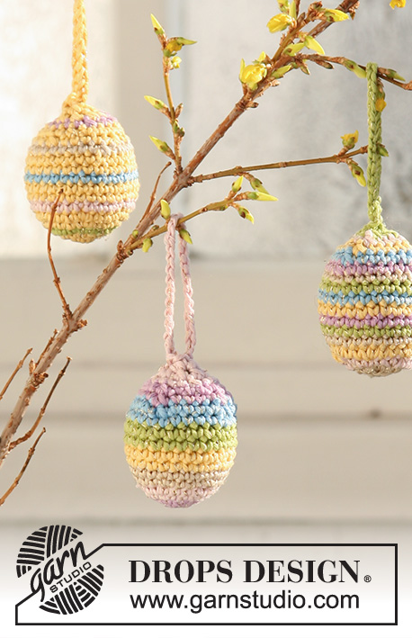 Candy Eggs / DROPS Extra 0-500 - Crocheted DROPS Easter egg and DROPS Easter basket in ”Muskat” and ”Glitter”.