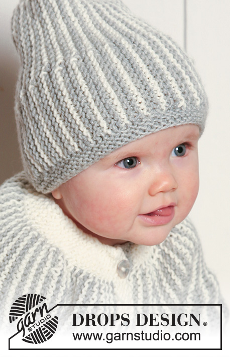 Magnus Set / DROPS Extra 0-639 - Settet består av:
Rillestrikket DROPS jakke og lue, strikket sidelengs i ”Merino Extra Fine”. til barn og baby