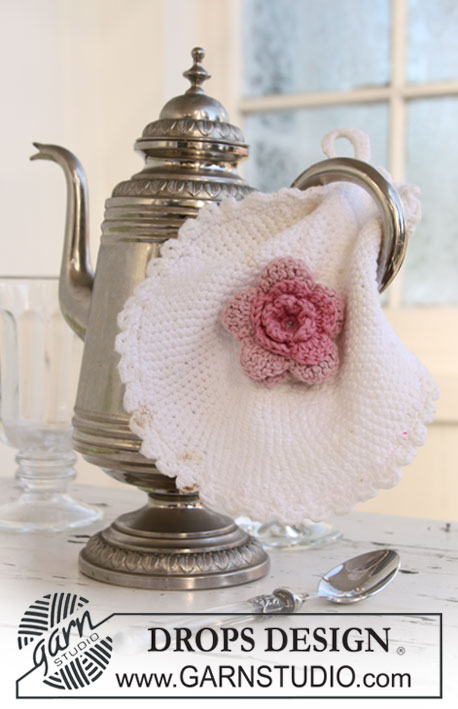 DROPS Extra 0-680 - DROPS pot holder with flower in ” Safran”. 