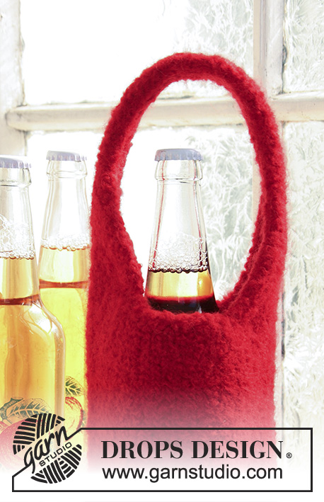 Take Me Home / DROPS Extra 0-729 - Knitted and felted bottle cover for wine bottle in DROPS Snow. Piece is worked with a handle and can be used as a bag or gift bag for wine bottle. Theme: Christmas