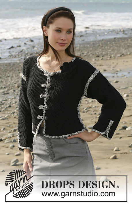 DROPS 101-21 - DROPS jacket Knitted with moss stitch in “Alpaca” and “Safran” with crochet edges and crochet flower