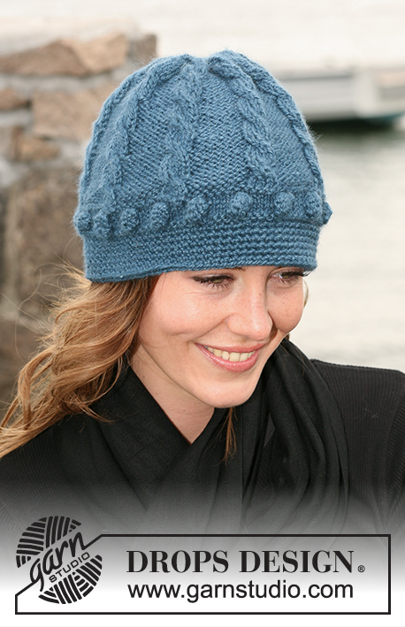 Blue Fog / DROPS 102-25 - Hat and gloves in ”Silke-Alpaca” with cables and bubbles and crocheted edge.
