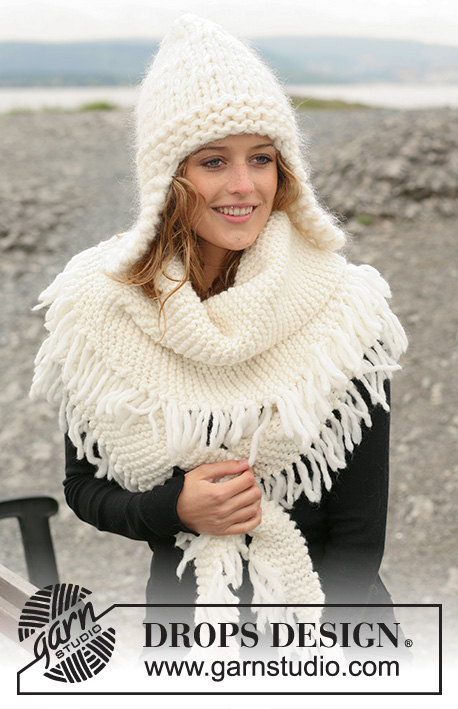 DROPS 109-18 - Set comprising: Knitted DROPS hat with ear flaps in 1 thread Vienna and 2 threads Snow or 1 thread Vienna and 1 thread Polaris. Shawl in garter st with tassels in 1 thread Snow or Polaris.