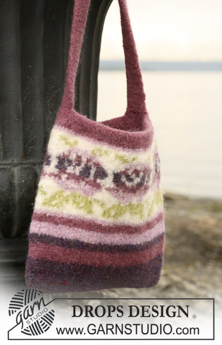 Wine and Roses / DROPS 109-50 - DROPS felted bag in  ”Snow” with rose border pattern.