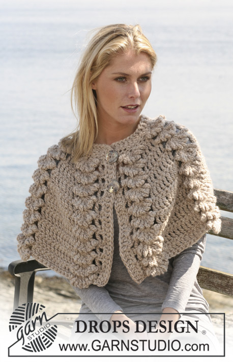 Shells on the Shore / DROPS 110-9 - Crochet DROPS cape with shell pattern in ”Snow”. Size S - XL.