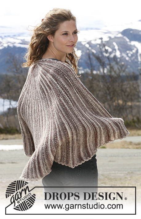 Caracola / DROPS 114-36 - Knitted DROPS shawl in garter st in ”Fabel”.