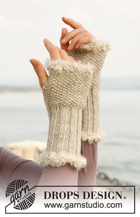 Elegance / DROPS 131-31 - Knitted DROPS wrist warmers in ”Nepal” with crochet border in “Puddel”. 