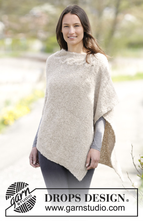 Weekend Wrap / DROPS 164-47 - Knitted DROPS poncho in garter st and stockinette st with cable in ”Alpaca Bouclé”. Size S-XXXL.