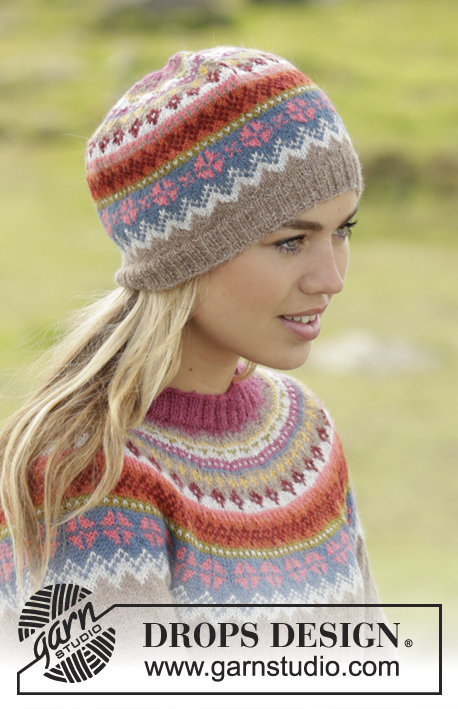 Stavanger / DROPS 173-51 - Set consists of: Knitted DROPS jumper worked top down with round yoke and multi-coloured pattern on yoke in ”Alpaca”. Hat with multi-coloured pattern in “Alpaca”. Size: S - XXXL.
