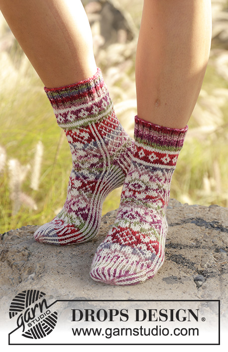 Flower Music / DROPS 178-13 - Knitted socks in multi-colored pattern in DROPS Fabel.