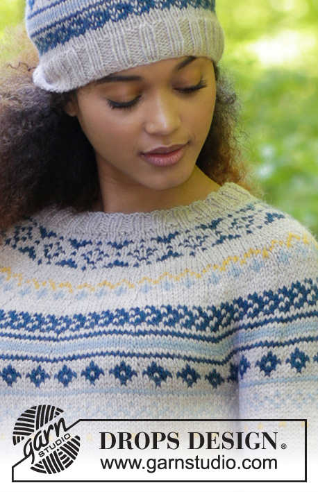 Lillehammer / DROPS 180-18 - The set consists of: Knitted hat with multi-colored Norwegian pattern and pom pom. Jumper with round yoke and multi-colored pattern, worked top down. Sizes S - XXXL.
The piece is worked in DROPS Nepal.