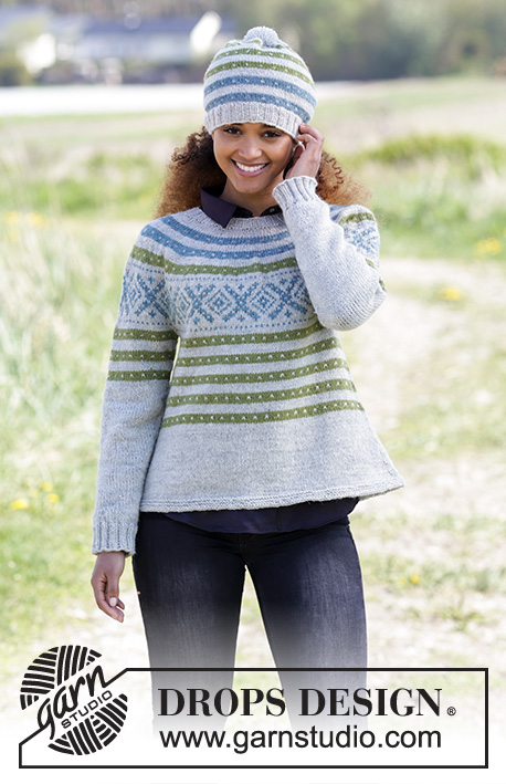 Nova Scotia / DROPS 180-22 - Set consists of: Knitted hat with Nordic Fana pattern and pompom. Jumper with round yoke, Nordic Fana pattern and A-shape, knitted top down. Size: S - XXXL Set is knitted in DROPS Karisma.
