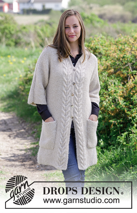 Elegant Comfort Jacket / DROPS 180-33 - Knitted jacket with moss stitch, cables, shawl collar and pockets. Sizes S - XXXL.
The piece is worked in DROPS Air.