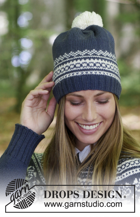 Lofoten Hat / DROPS 181-11 - Hat with multi-colored Norwegian pattern and pom pom.
The piece is knitted in DROPS Lima.