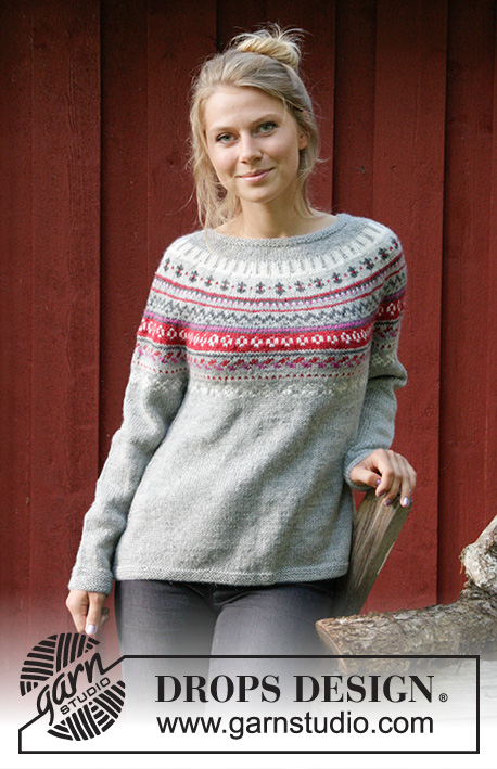 Winter Berries / DROPS 181-16 - The set consists of: Knitted jumper with round yoke, multi-colored Norwegian pattern and A-shape, worked top down. Sizes S - XXXL. Wrist warmers with multi-colored Norwegian pattern.
The set is worked in DROPS Karisma.