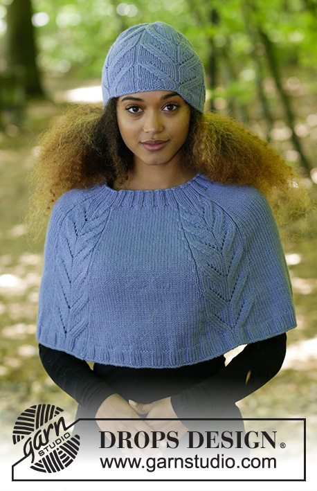 Laila / DROPS 182-18 - L’ensemble se compose de: bonnet et poncho au tricot, avec torsades et côtes. Du S au XXXL. 
L'ensemble se tricote en DROPS Nepal.
