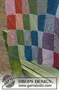 Autumn Nights / DROPS 184-13 - Couverture tricotée avec des dominos, au point mousse rayé. Se tricote en DROPS Alpaca.