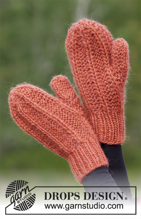 Tangerine / DROPS 184-16 - Set consists of: Knitted scarf, hat and mittens with False Fisherman’s rib variation and garter stitch. 
Set is knitted in DROPS Snow.