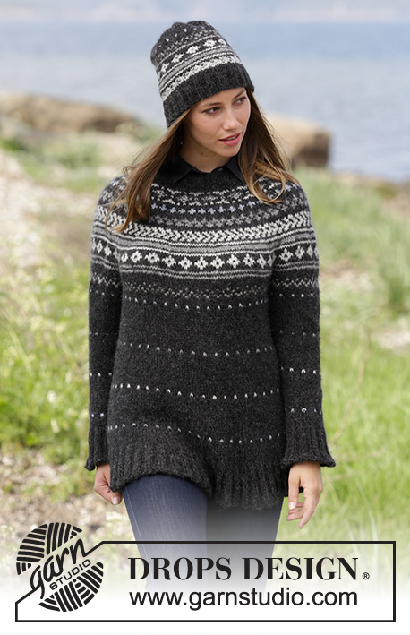 Night Shade / DROPS 184-26 - Set consists of: Jumper with round yoke and multi-coloured Norwegian pattern, worked top down. Hat with multi-coloured Norwegian pattern. Size: S - XXXL
Set is knitted in DROPS Air.