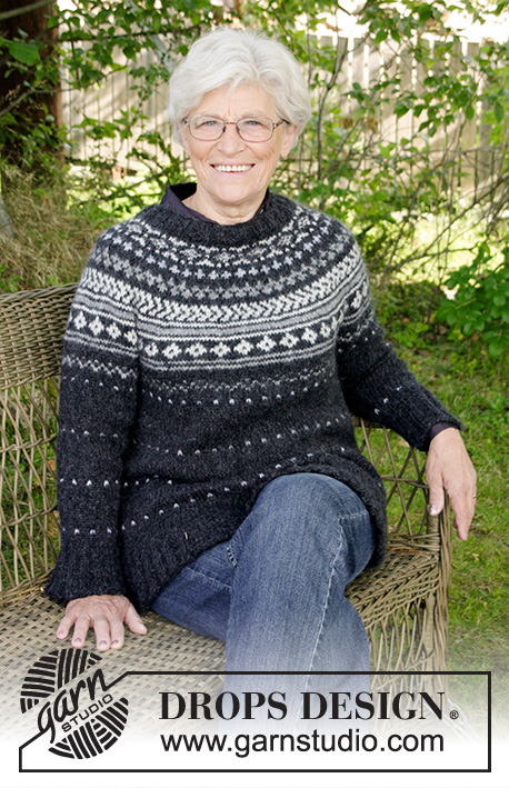 Night Shade / DROPS 184-26 - Set consists of: Sweater with round yoke and multi-colored Nordic pattern, worked top down. Hat with multi-colored Nordic pattern. Size: S - XXXL
Set is knitted in DROPS Air.