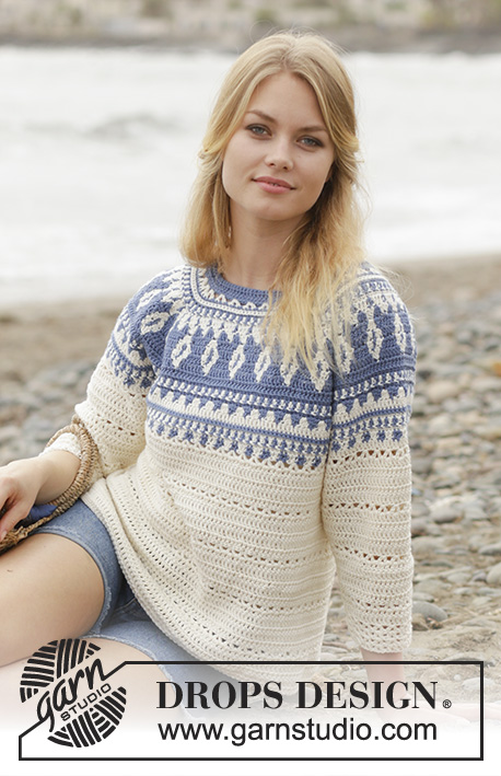 Nordic Fling / DROPS 186-34 - Sweater with multi-colored pattern and round yoke, crocheted top down with 3/4 long sleeves and A-shape. Size: S - XXXL Piece is crocheted in DROPS Cotton Merino.