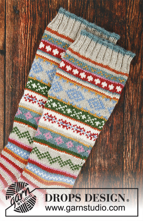Winter Carnival Socks / DROPS 193-1 - Knitted socks in DROPS Karisma. The piece is worked with stripes and Nordic pattern.