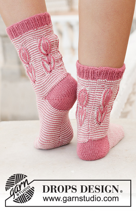 Spring Brings / DROPS 198-15 - Knitted toe-up socks in DROPS Nord. The piece is worked with stripes and 2-colored flower in English rib on the leg. Sizes 35 – 43 = 5 - 10 1/2.