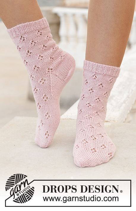 Step into Spring / DROPS 198-18 - Knitted socks in DROPS Nord. Piece is knitted top down with lace pattern. Size 35 to 43