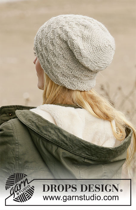 By The Docks / DROPS 204-20 - Knitted hat in DROPS Nepal. Piece is knitted back and forth in quadruple moss stitch.