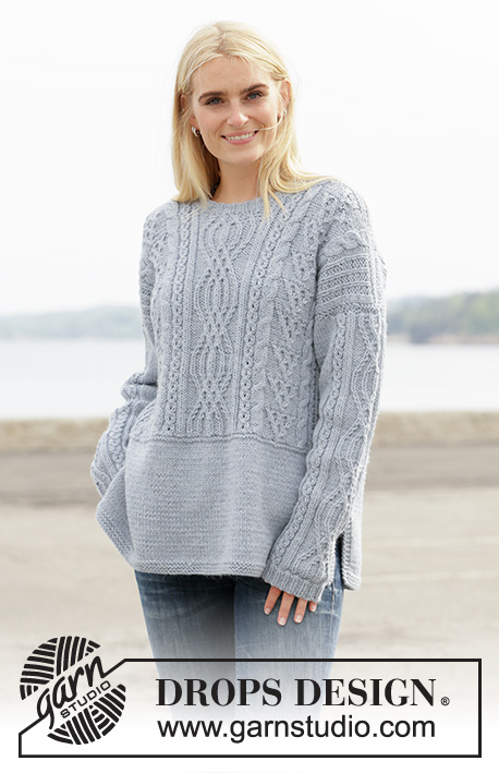 Mists of Time / DROPS 205-28 - Knitted jumper in DROPS Alaska. The piece is worked with cables and texture. Sizes S - XXXL.