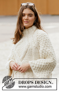 Frosted Cathedral / DROPS 206-23 - Knitted jumper with raglan in DROPS Polaris. The piece is worked top down with cables and moss stitch. Sizes S - XXXL.