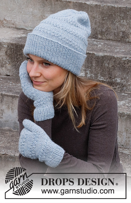 Pearl Essence / DROPS 214-27 - Knitted mittens and hat with textured pattern in DROPS Nepal.