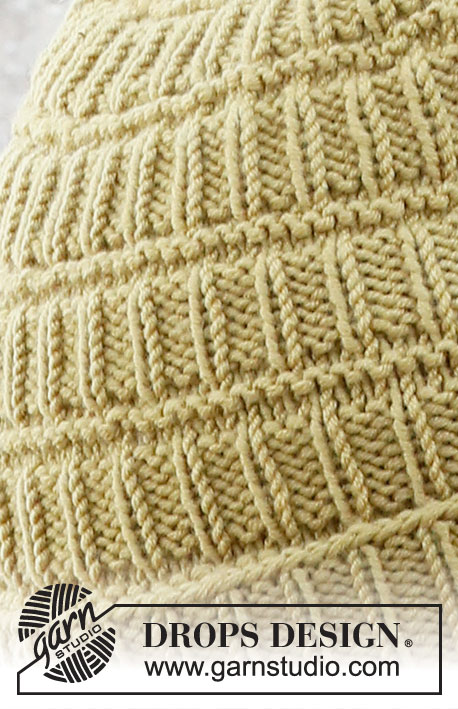 Honey Sweet / DROPS 214-39 - Knitted hat and mittens in DROPS Merino Extra Fine. Piece is knitted with textured pattern. 
