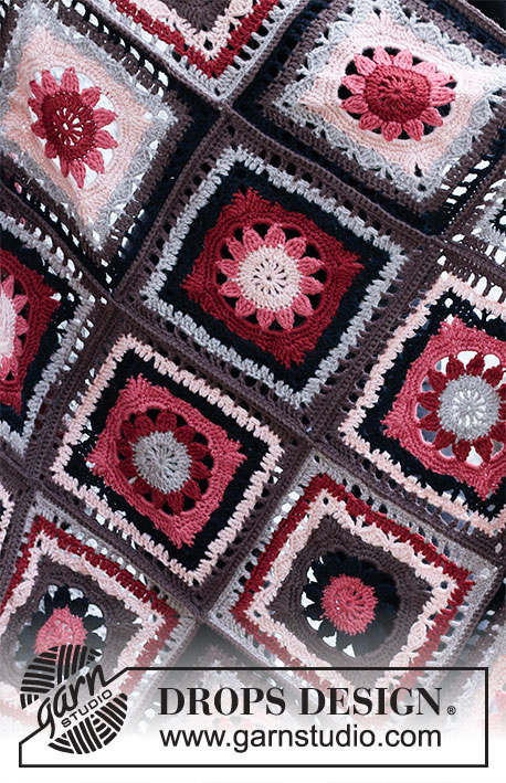 Chocolate Box / DROPS 214-5 - Couverture crochetée avec fleurs en DROPS Karisma - se compose de carrés crochetés ensemble.