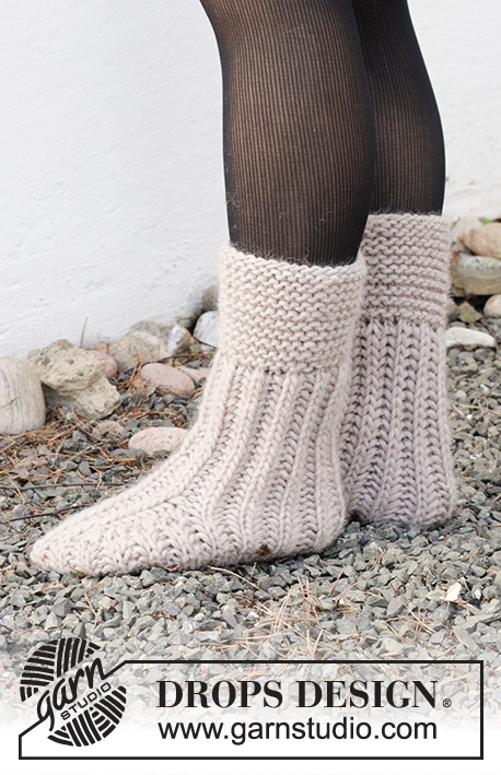 Rockslide Rockers / DROPS 214-61 - Knitted slippers with garter stitch and in English rib in DROPS Snow. Size 35-42 =
5-11.