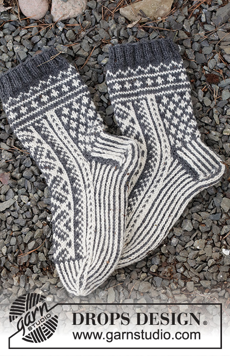 Sleigh Ride / DROPS 214-63 - Strikkede sokker i DROPS Lima. Arbeidet strikkes ovenfra og ned med nordisk mønster. Størrelse 35 - 43. Tema: Jul