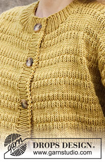 Mustard Seeds Cardigan / DROPS 215-17 - Propínací svetr - kabátek s plastickým vzorem pletený z příze DROPS Merino Extra Fine. Velikost S - XXXL.